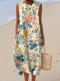Sleeveless wrap dress with a retro floral print in soft warm tones