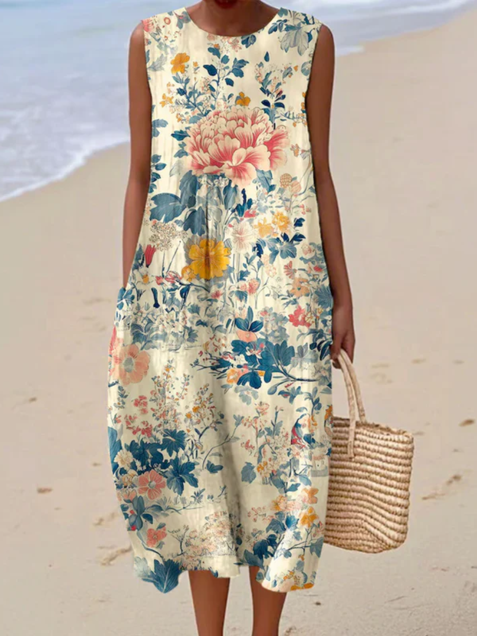 Sleeveless wrap dress with a retro floral print in soft warm tones