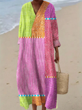 A sleeveless colourful patchwork stripe dress available in pink, orange and green colourways
