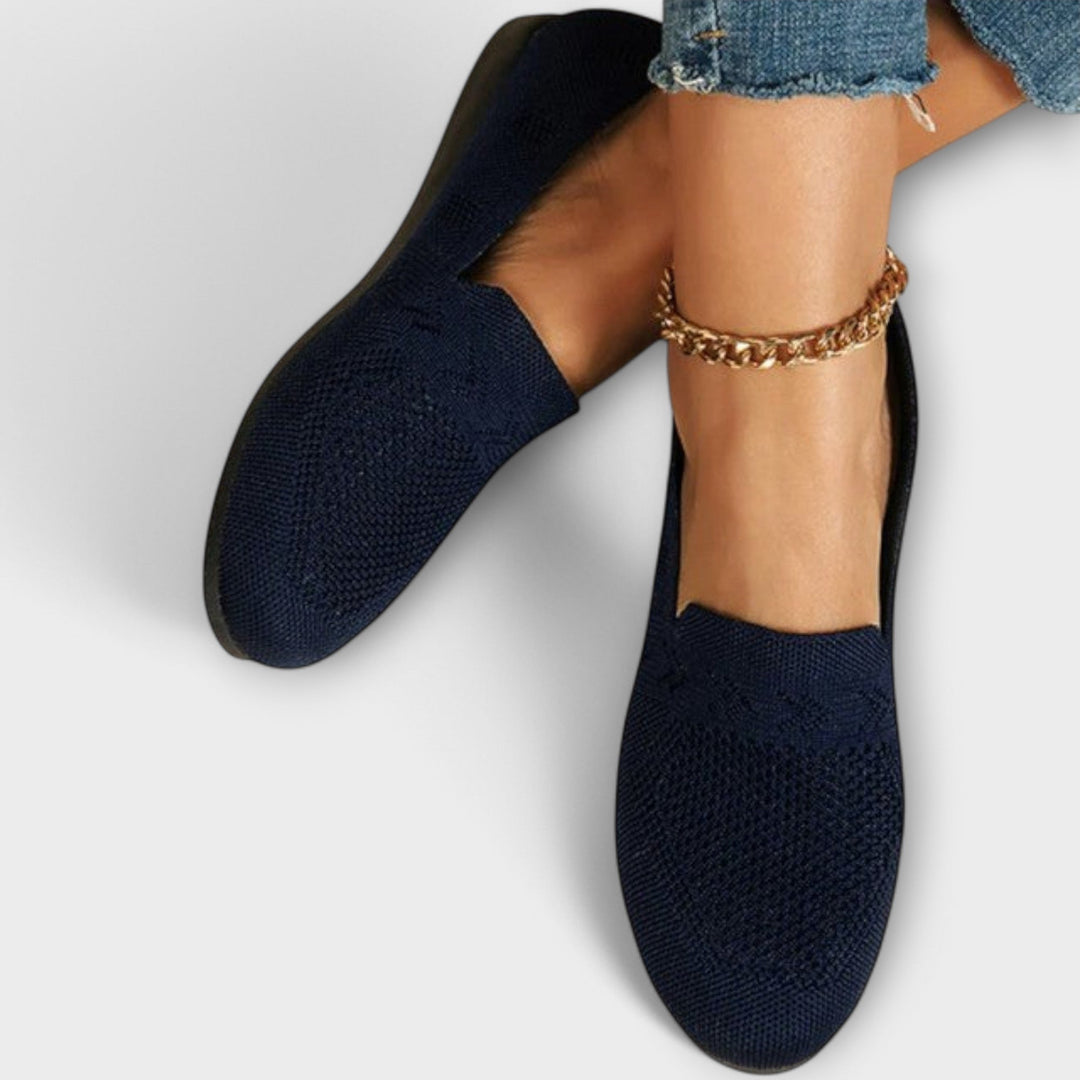 Classic loafers in blue, black and purple with a refined, timeless silhouette