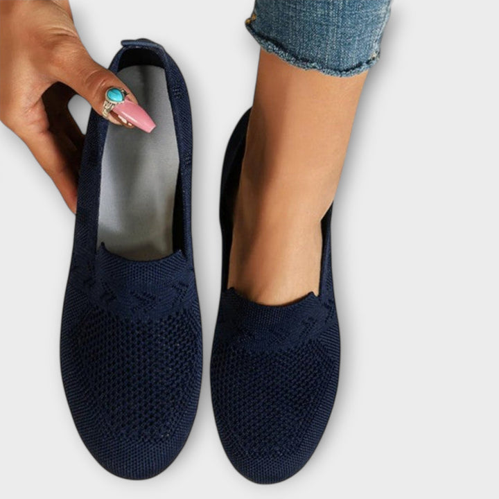 Classic loafers in blue, black and purple with a refined, timeless silhouette