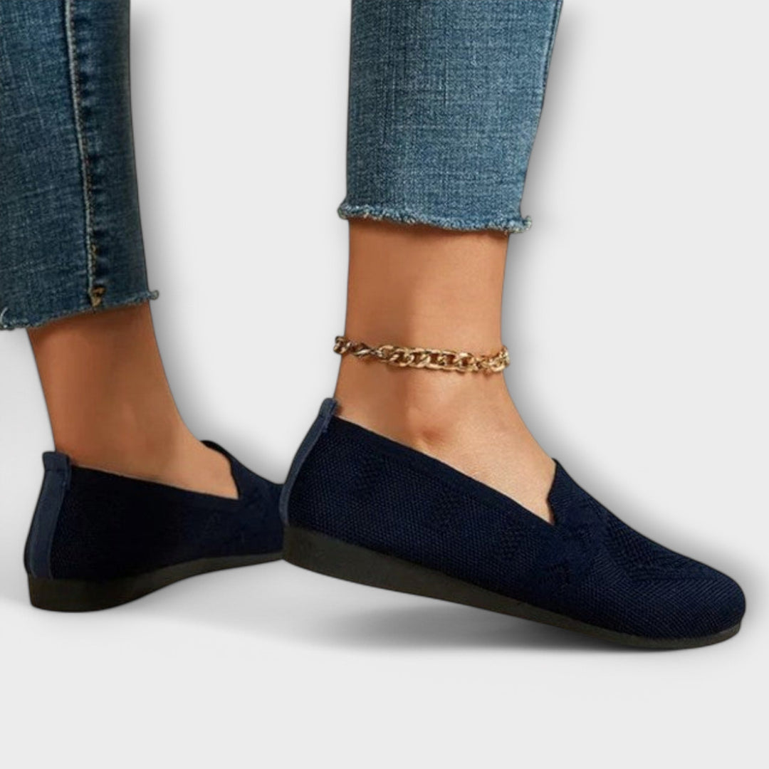 Classic loafers in blue, black and purple with a refined, timeless silhouette