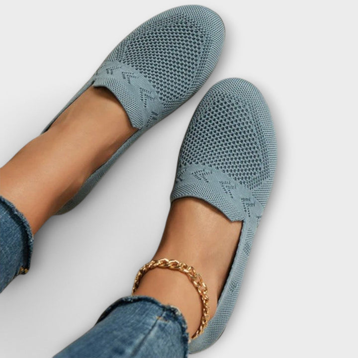 Classic loafers in blue, black and purple with a refined, timeless silhouette