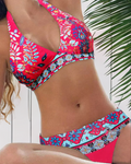 Pink floral push-up bikini with high-waist bottoms and bright floral print