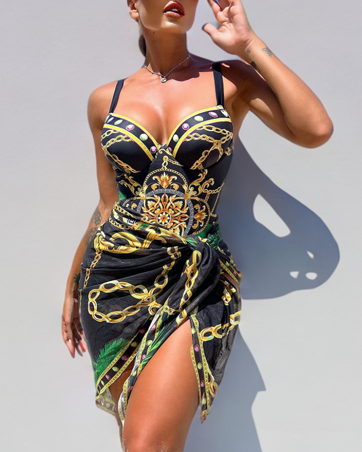 Black animal print one-piece swimsuit with integrated skirt detail and padded bust