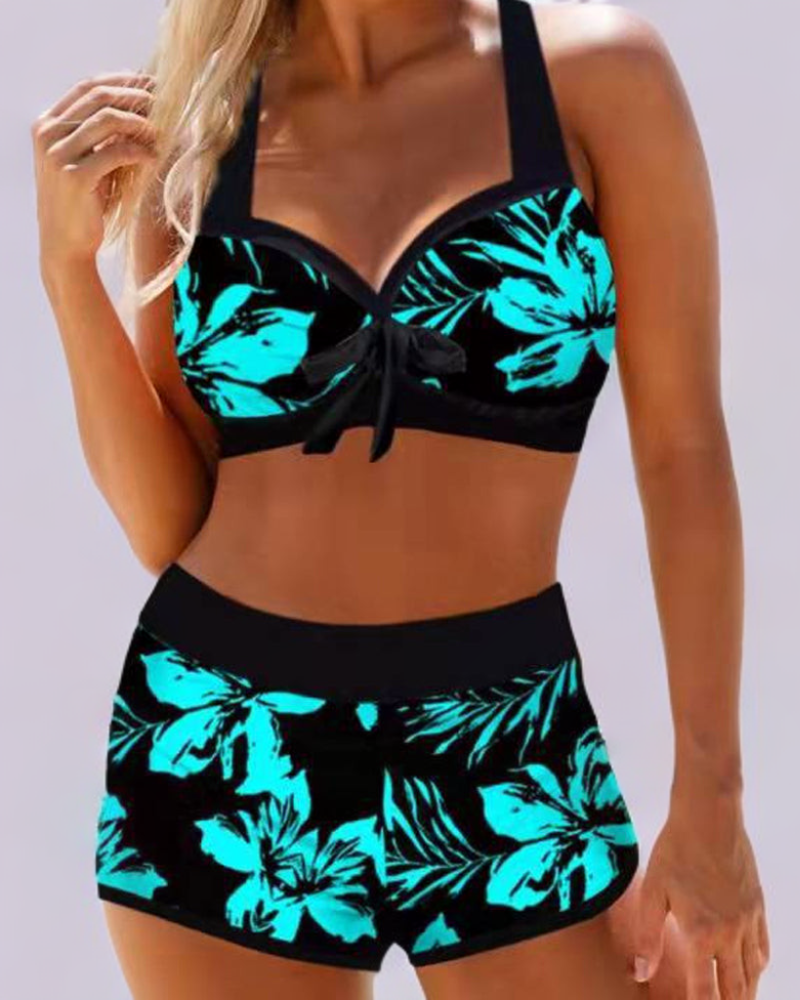 Turquoise floral high-waist bikini with a bright print and a high-cut brief