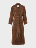 Classic belted trench coat in rich brown with a flowing, tailored silhouette and elegant collar