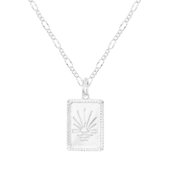 Gold radiant sun pendant necklace on fine polished chain