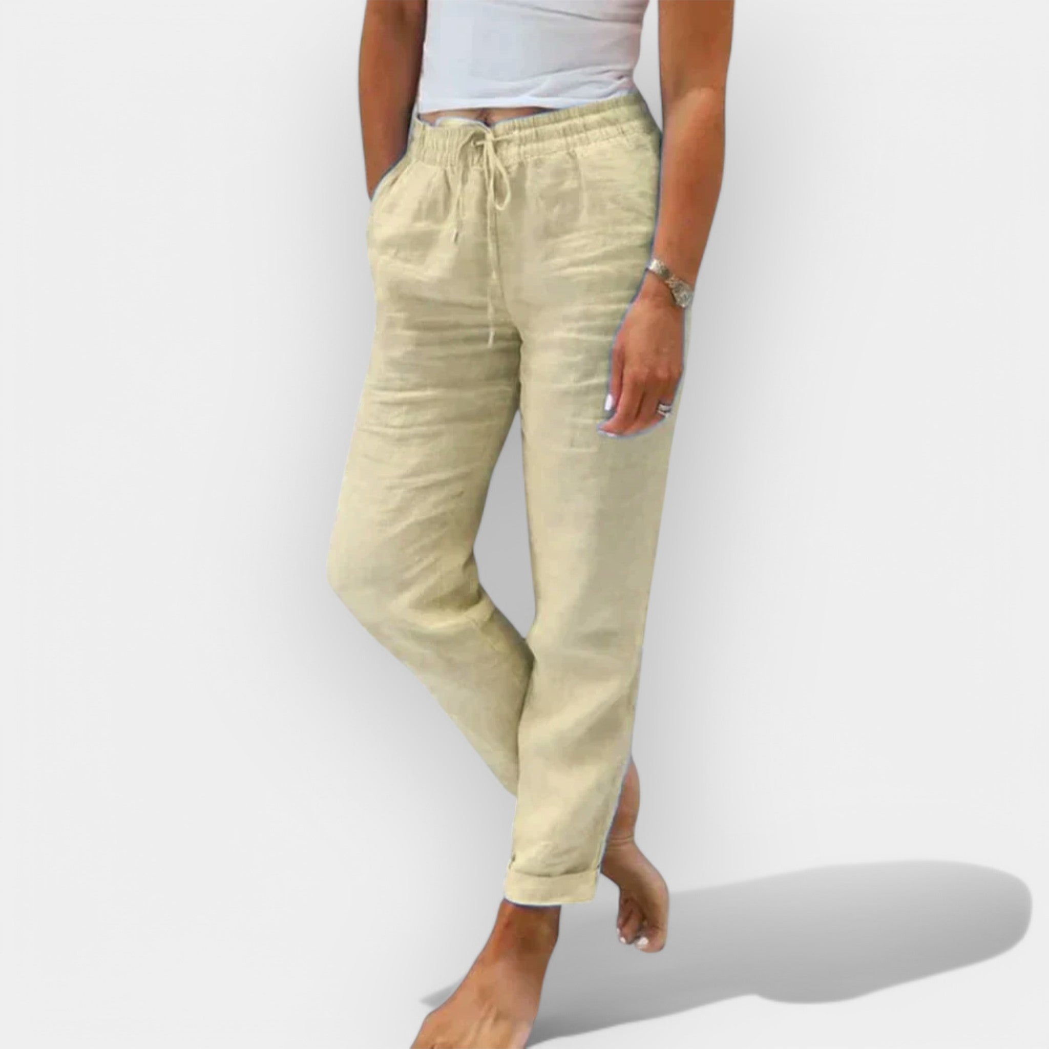 Light women's summer trousers in green with a wide, flowing leg silhouette
