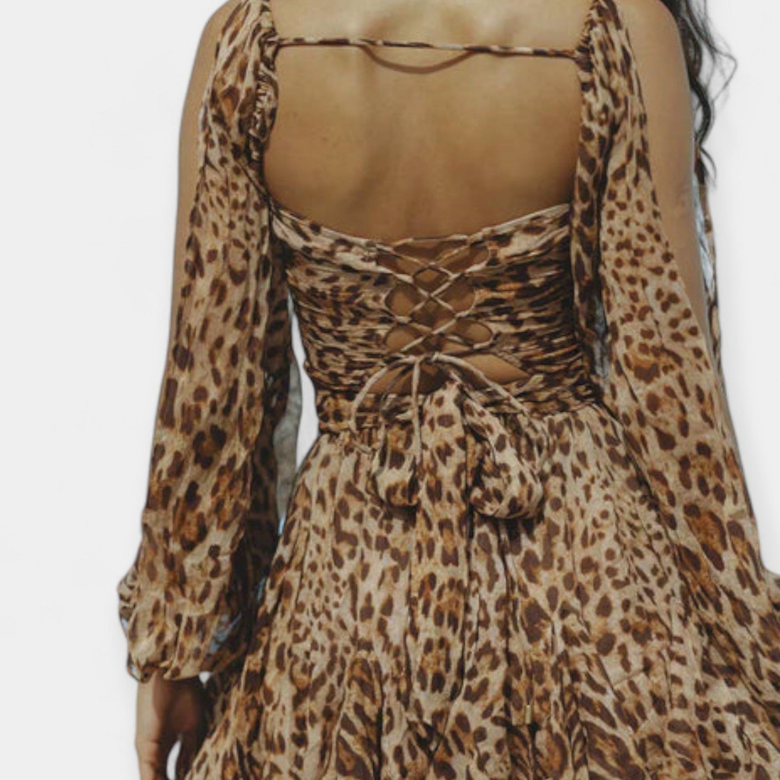 Romantic puff-sleeve dress with V-neck and ruffled skirt in rich forest green