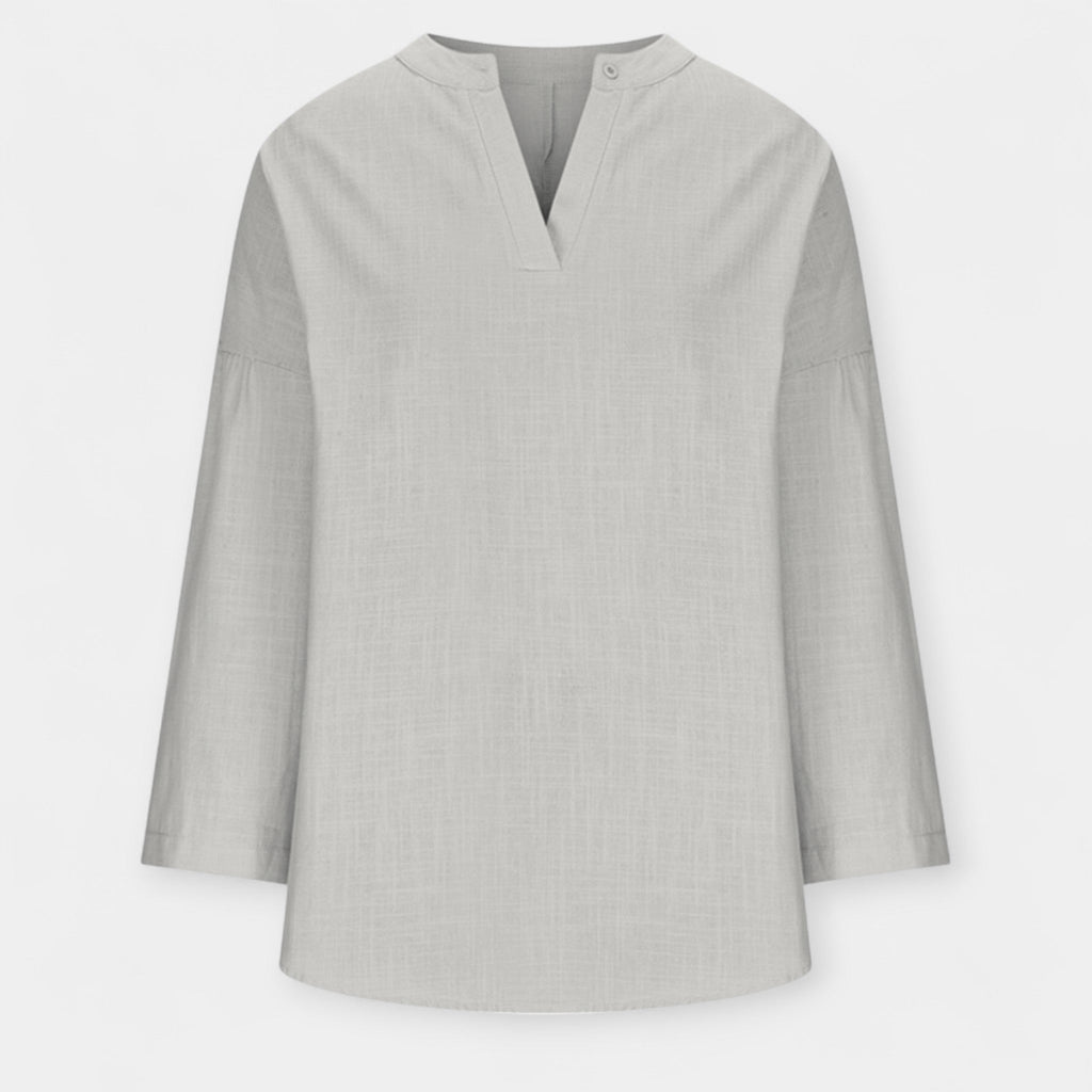 White relaxed beach blouse with a loose, comfortable fit and light breezy feel