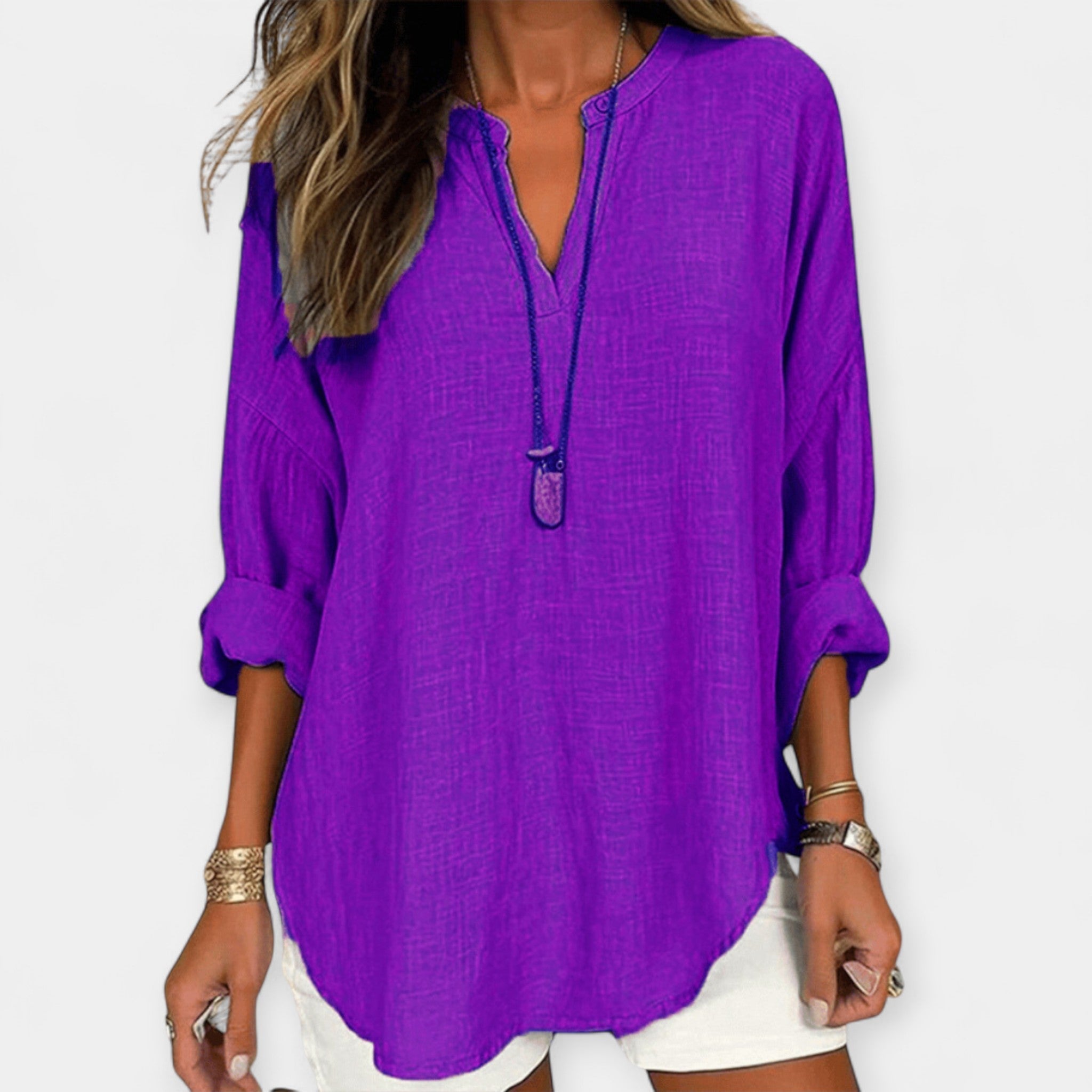 White relaxed beach blouse with a loose, comfortable fit and light breezy feel
