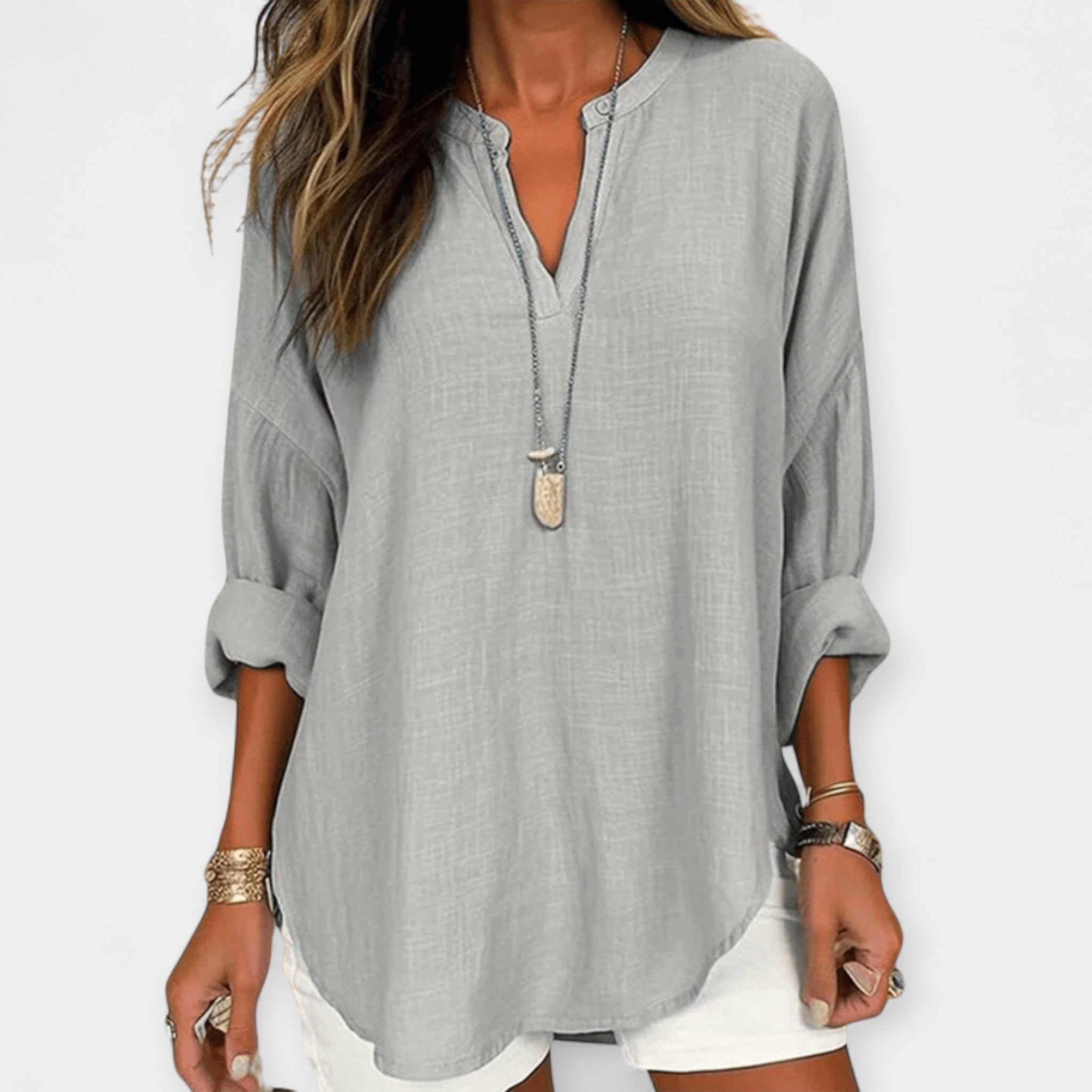Women's relaxed beach cover-up blouse in pale blue with a classic collar and long rollable sleeves