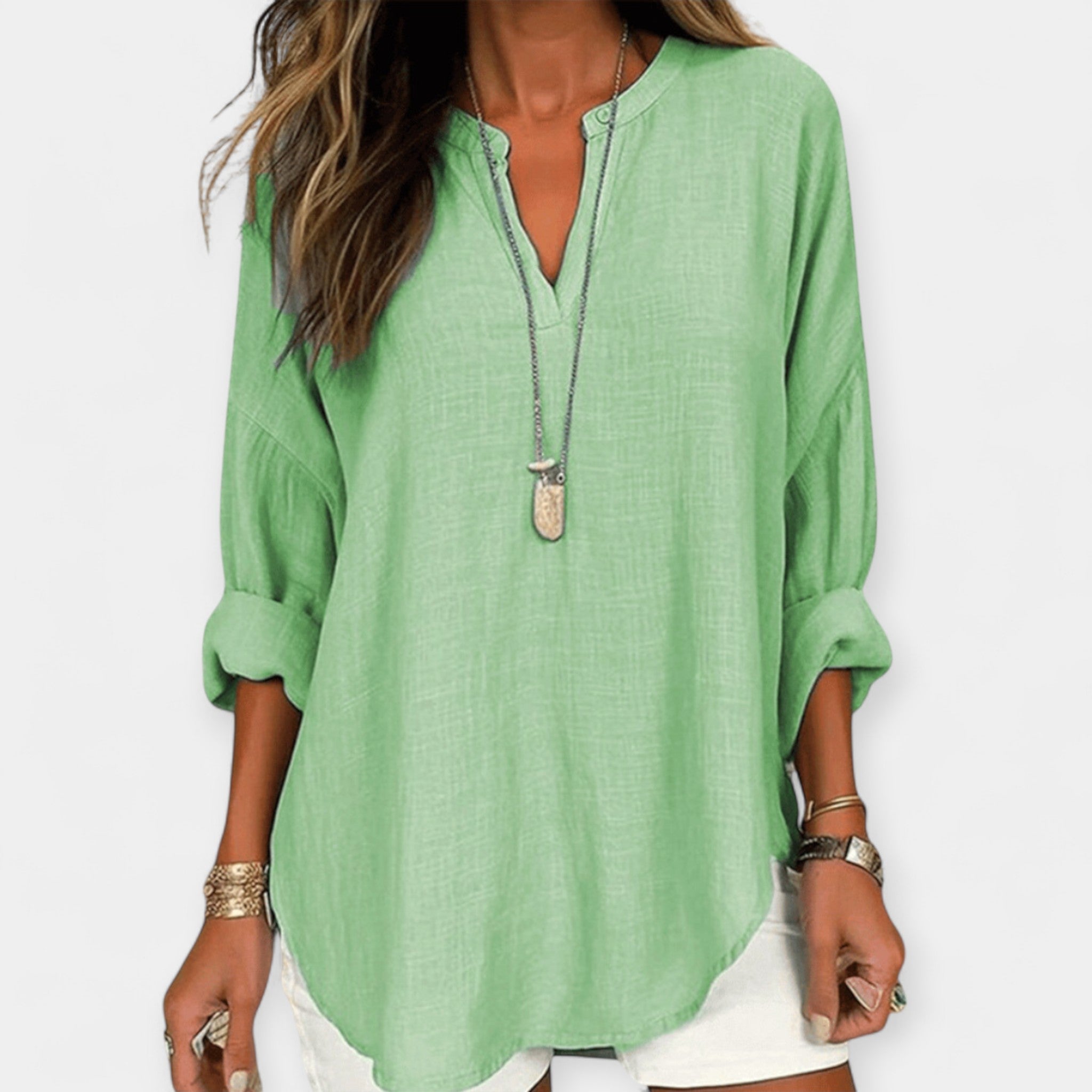 White relaxed beach blouse with a loose, comfortable fit and light breezy feel