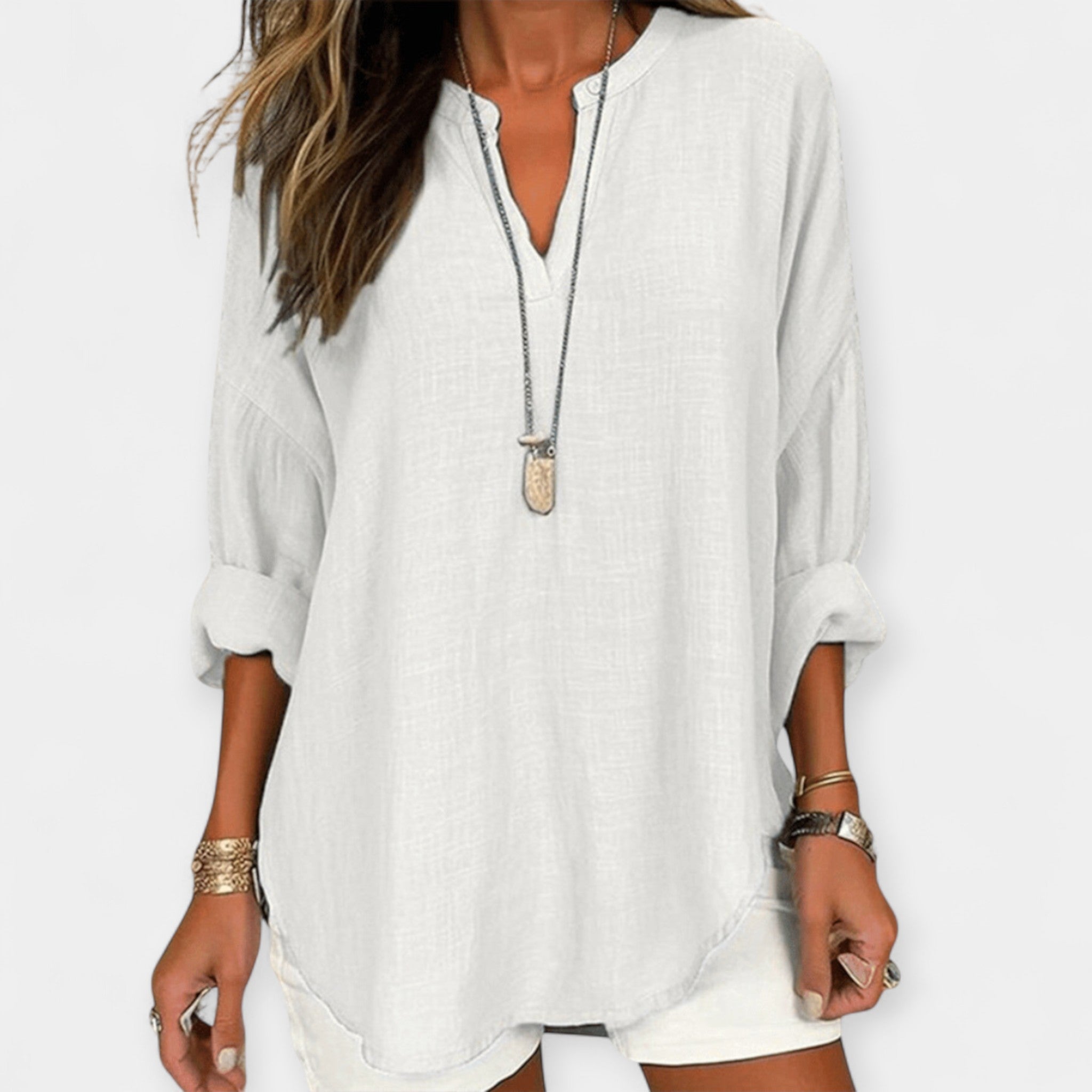 White relaxed beach blouse with a loose, comfortable fit and light breezy feel