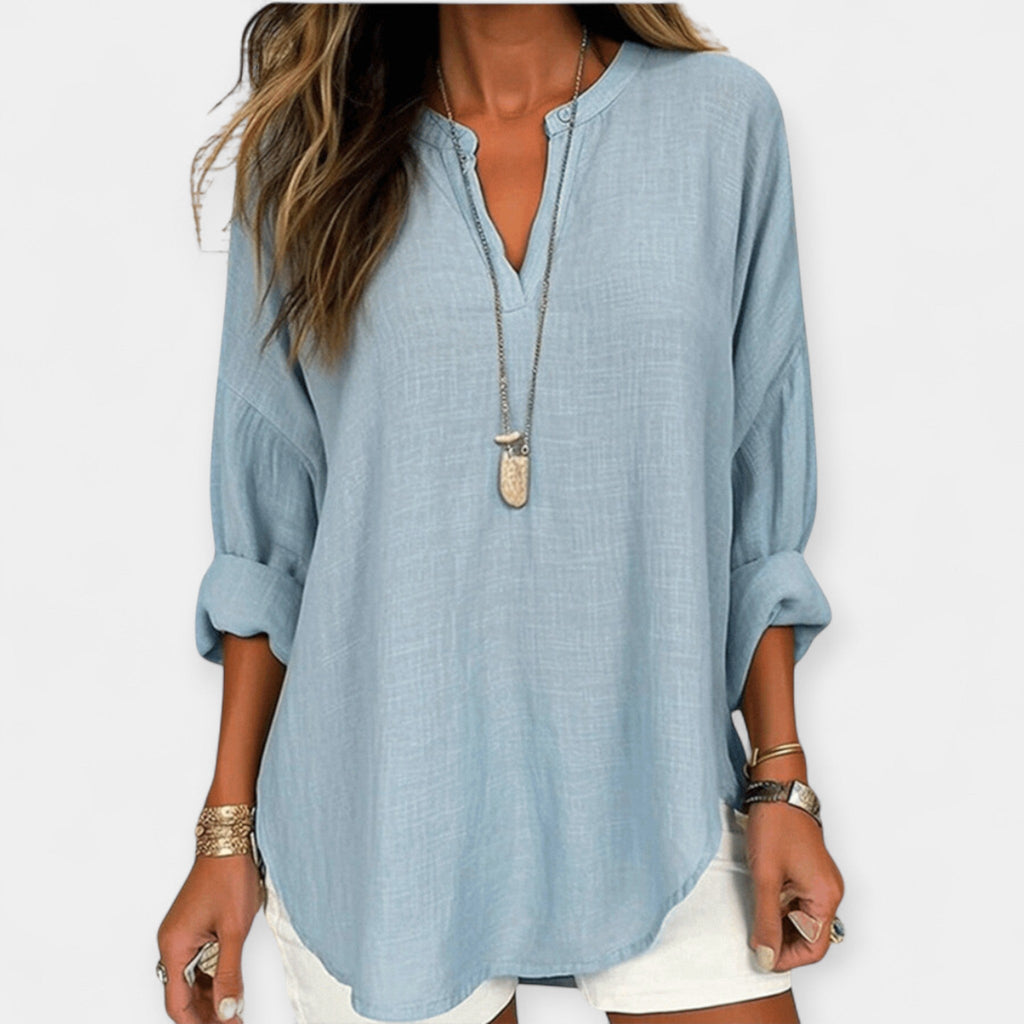 Women's relaxed beach cover-up blouse in pale blue with a classic collar and long rollable sleeves