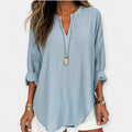 Women's relaxed beach cover-up blouse in pale blue with a classic collar and long rollable sleeves