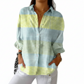 Blouse with a soft pastel blue and yellow grid print in a relaxed, floaty style
