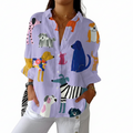 Purple floral meadow print blouse in a light, floaty style with spring-inspired tones