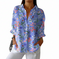 Multicolour blouse with cheerful colourful dog motifs all over in a relaxed casual style