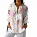Multicolour daisy patchwork blouse in soft pastel tones with a relaxed, feminine silhouette