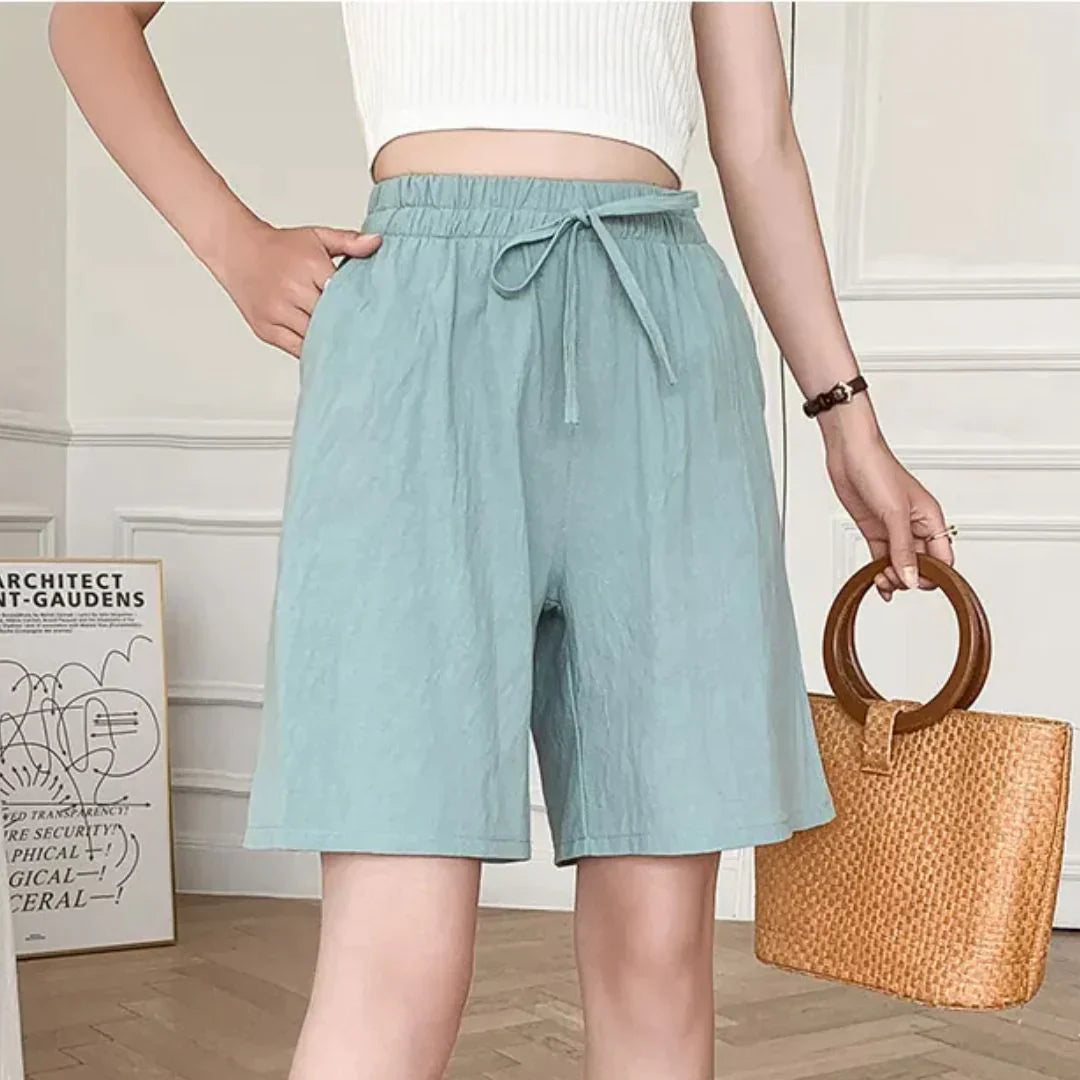 Women's high-waist shorts in khaki with a relaxed, flattering silhouette