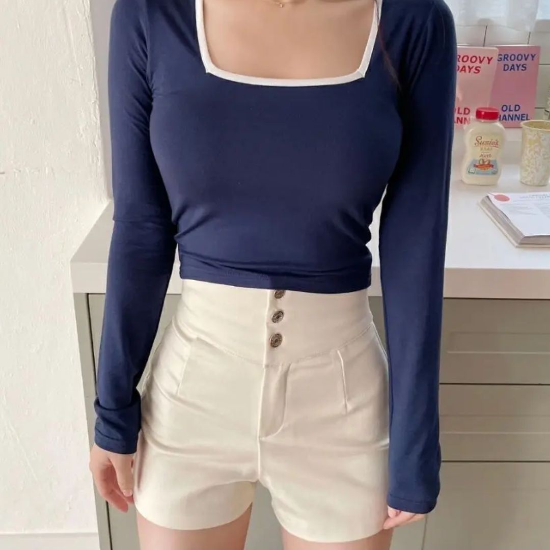 Women's high-waist shorts in crisp white with a clean, flattering silhouette