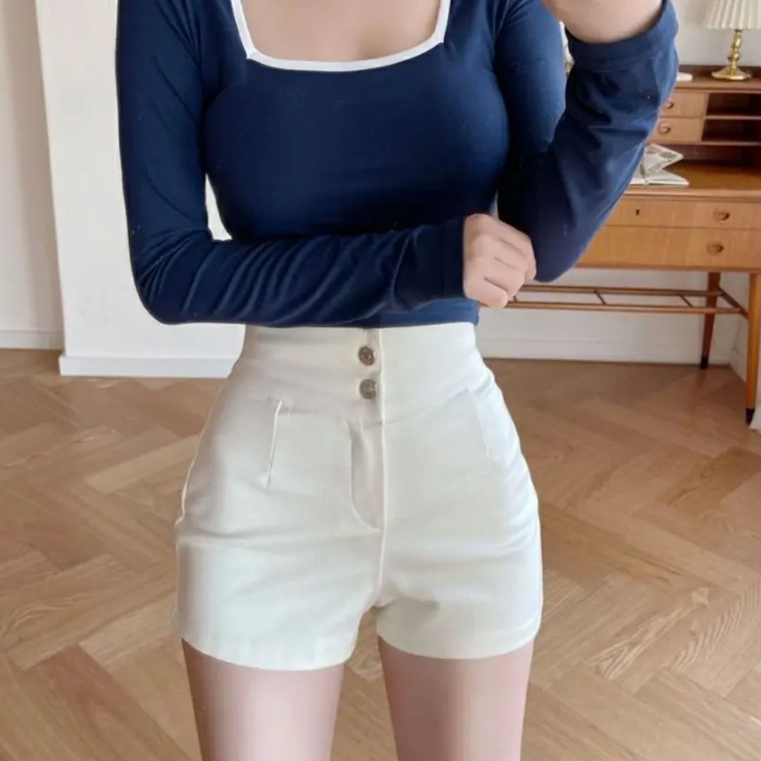 Women's high-waist shorts in crisp white with a clean, flattering silhouette