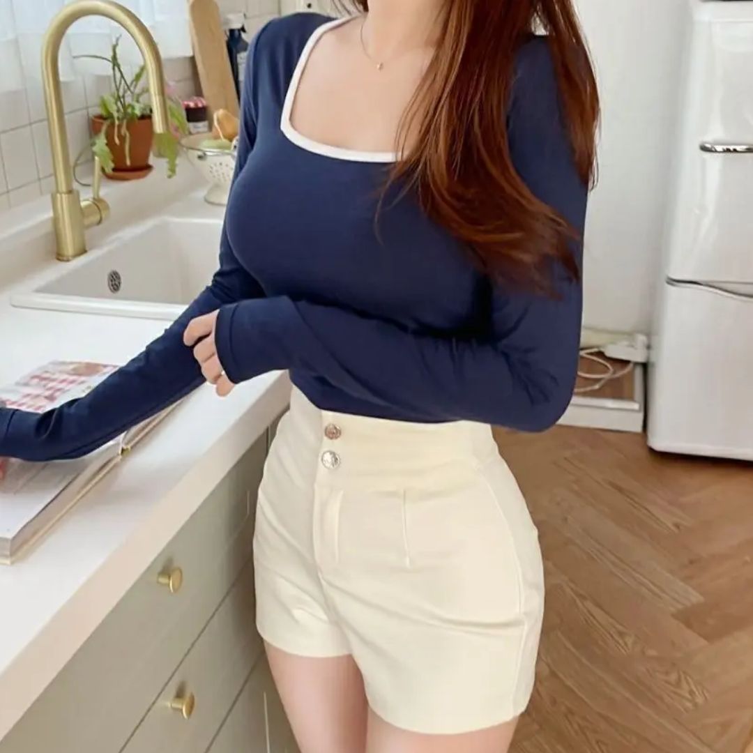 Women's high-waist shorts in crisp white with a clean, flattering silhouette