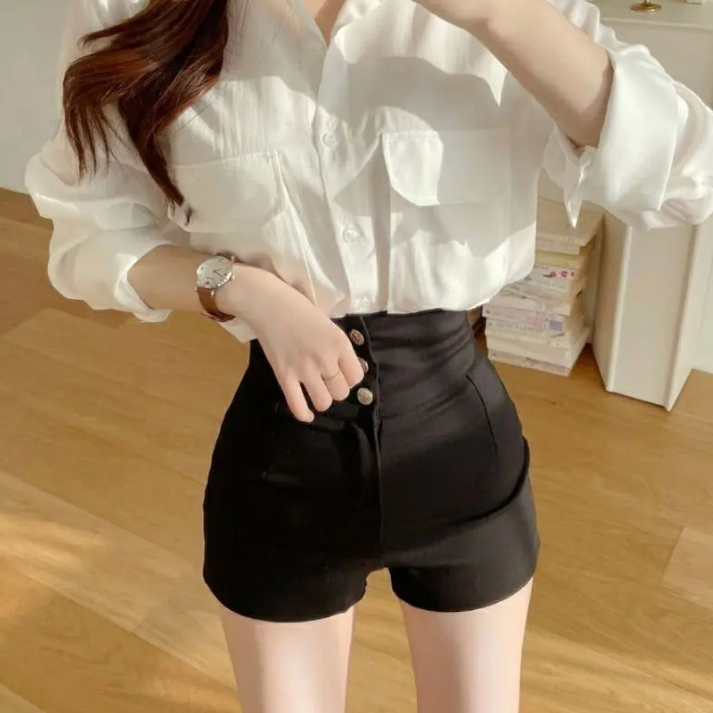 Women's high-waist shorts in crisp white with a clean, flattering silhouette