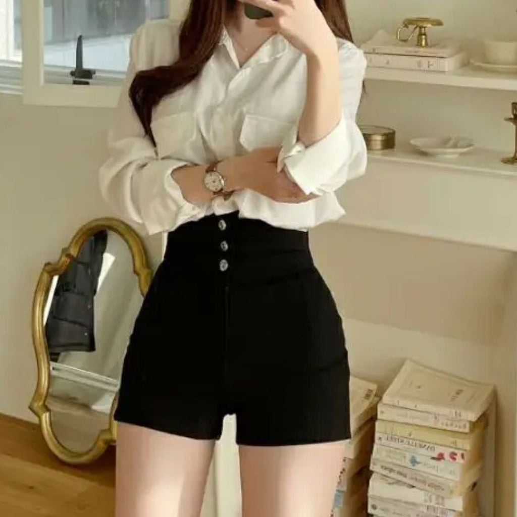 Women's high-waist shorts in crisp white with a clean, flattering silhouette
