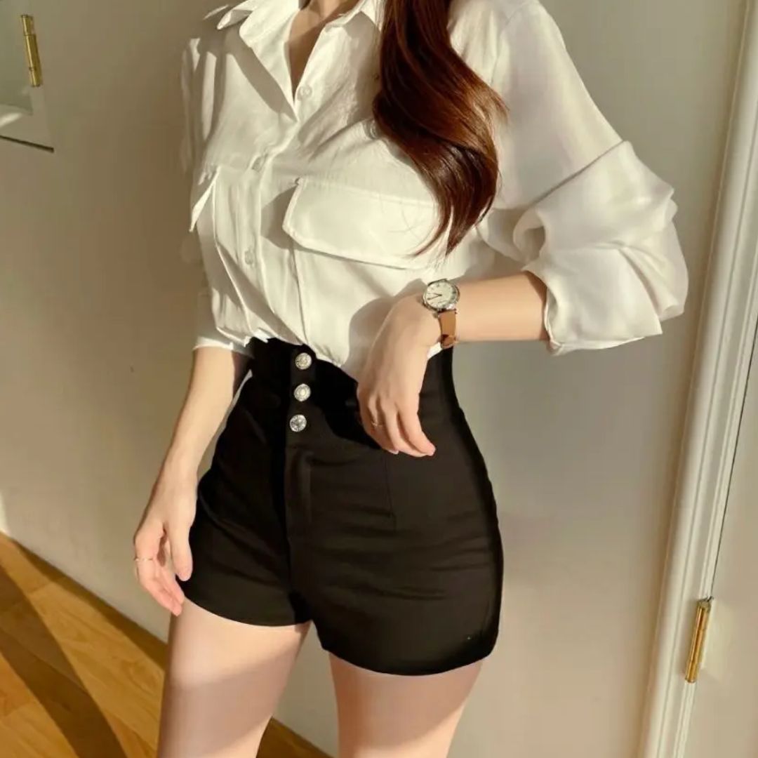 Women's high-waist shorts in crisp white with a clean, flattering silhouette