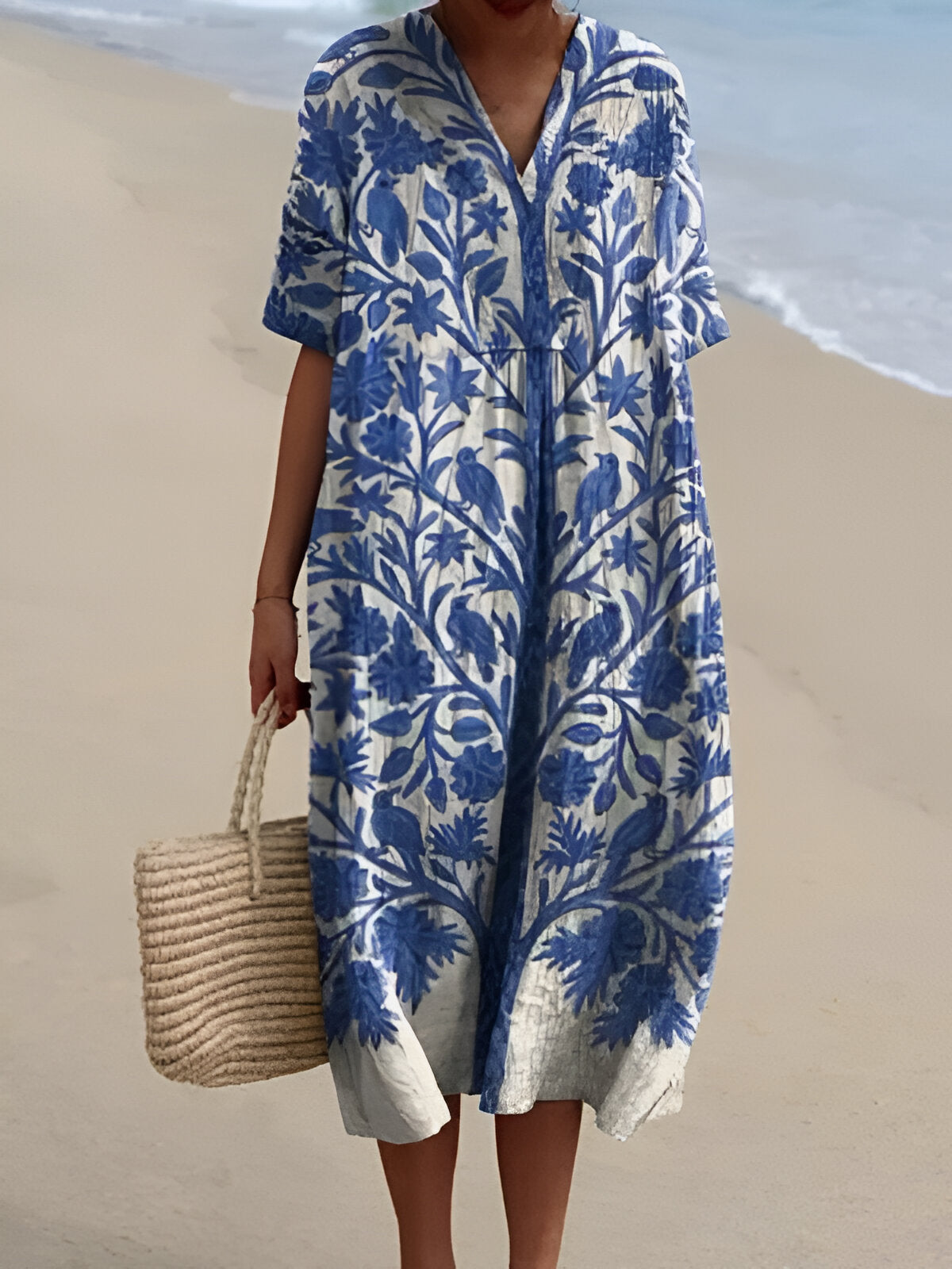 Floaty floral print summer dress with a soft V-neckline in a range of colourful styles