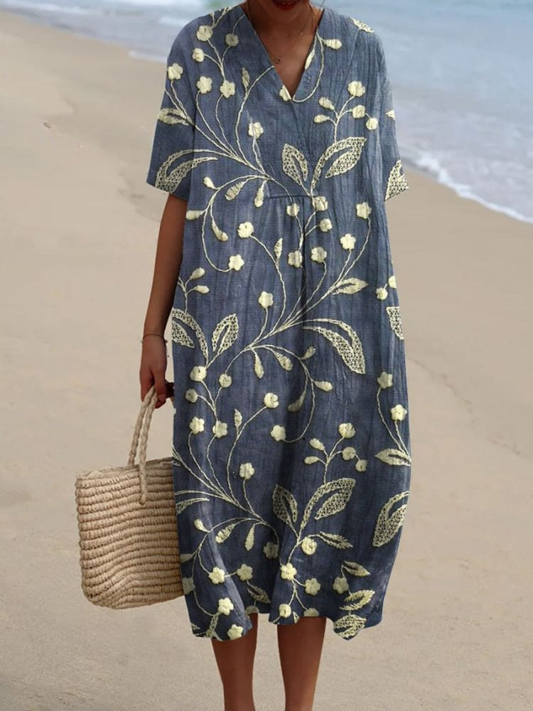 Floaty casual dress with a soft vintage floral print in warm natural tones