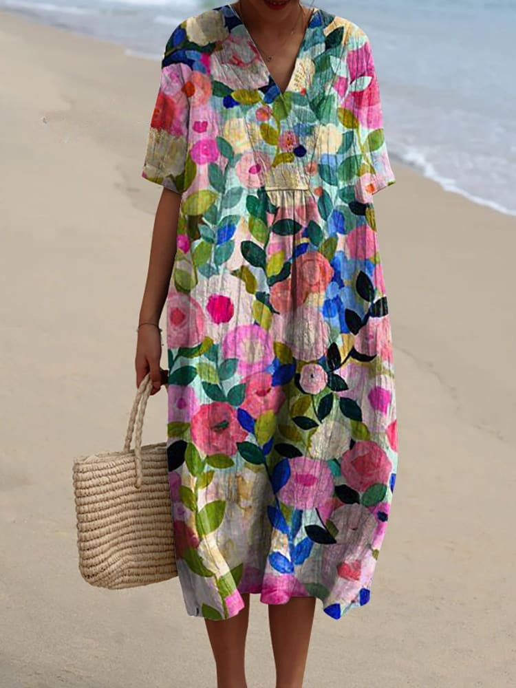 Bright floral print everyday dress with a relaxed silhouette and subtle back tie, shown in multiple print styles