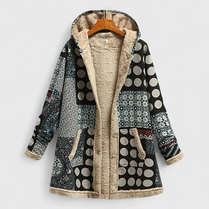 A cream hooded jacket with an all-over orange and green floral print and a soft lining.
