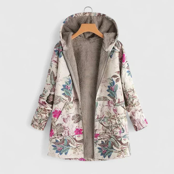 A cream hooded jacket with an all-over orange and green floral print and a soft lining.