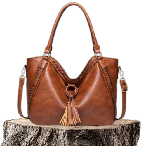 A woman carrying a soft pouch bag on her shoulder while out for a walk in town.