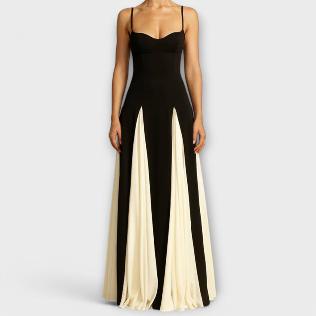 A classic black versatile midi dress styled simply for everyday elegance