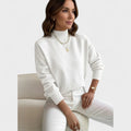 Soft roll-neck jumper in a close, elegant fit available in white, black and pastel shades