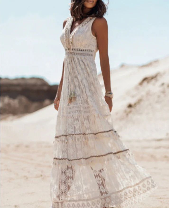 Woman wearing an elegant boho midi dress with a V-neckline at a daytime gathering.