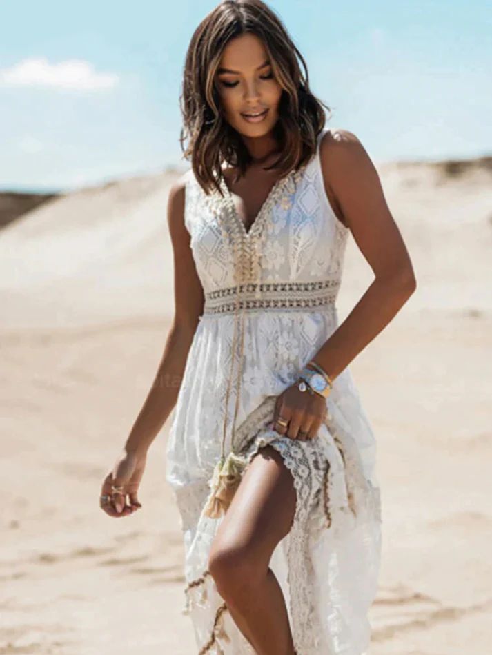 Woman wearing an elegant boho midi dress with a V-neckline at a daytime gathering.