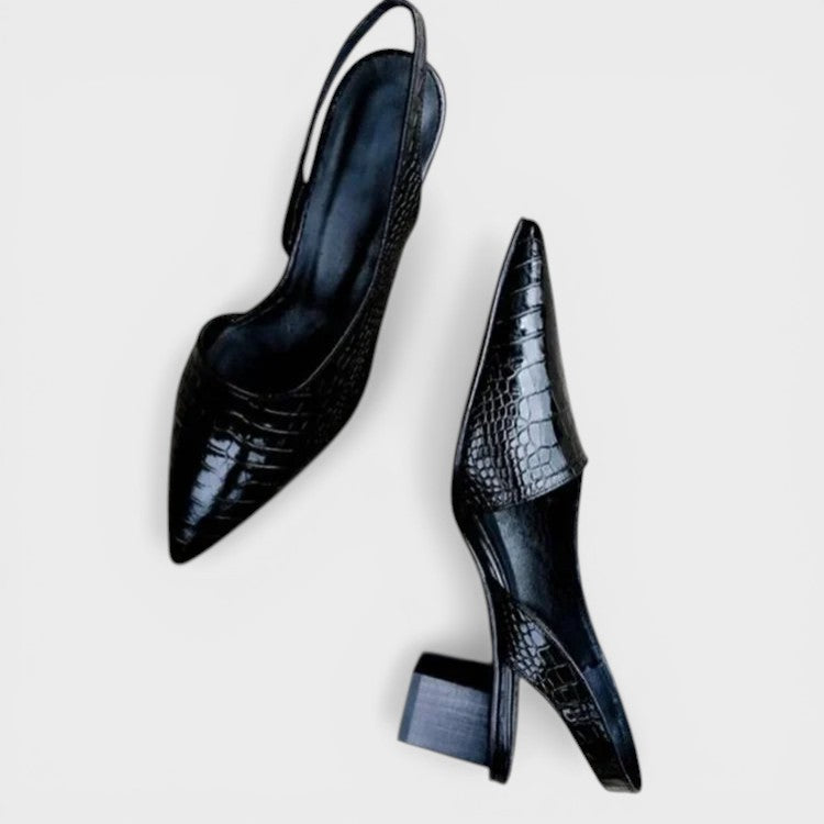 Women's pointed-toe slingback heels in dark brown with an adjustable back strap and elegant silhouette