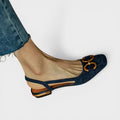 Adjustable orthopaedic sandals in beige and dark navy with supportive straps and cushioned footbed