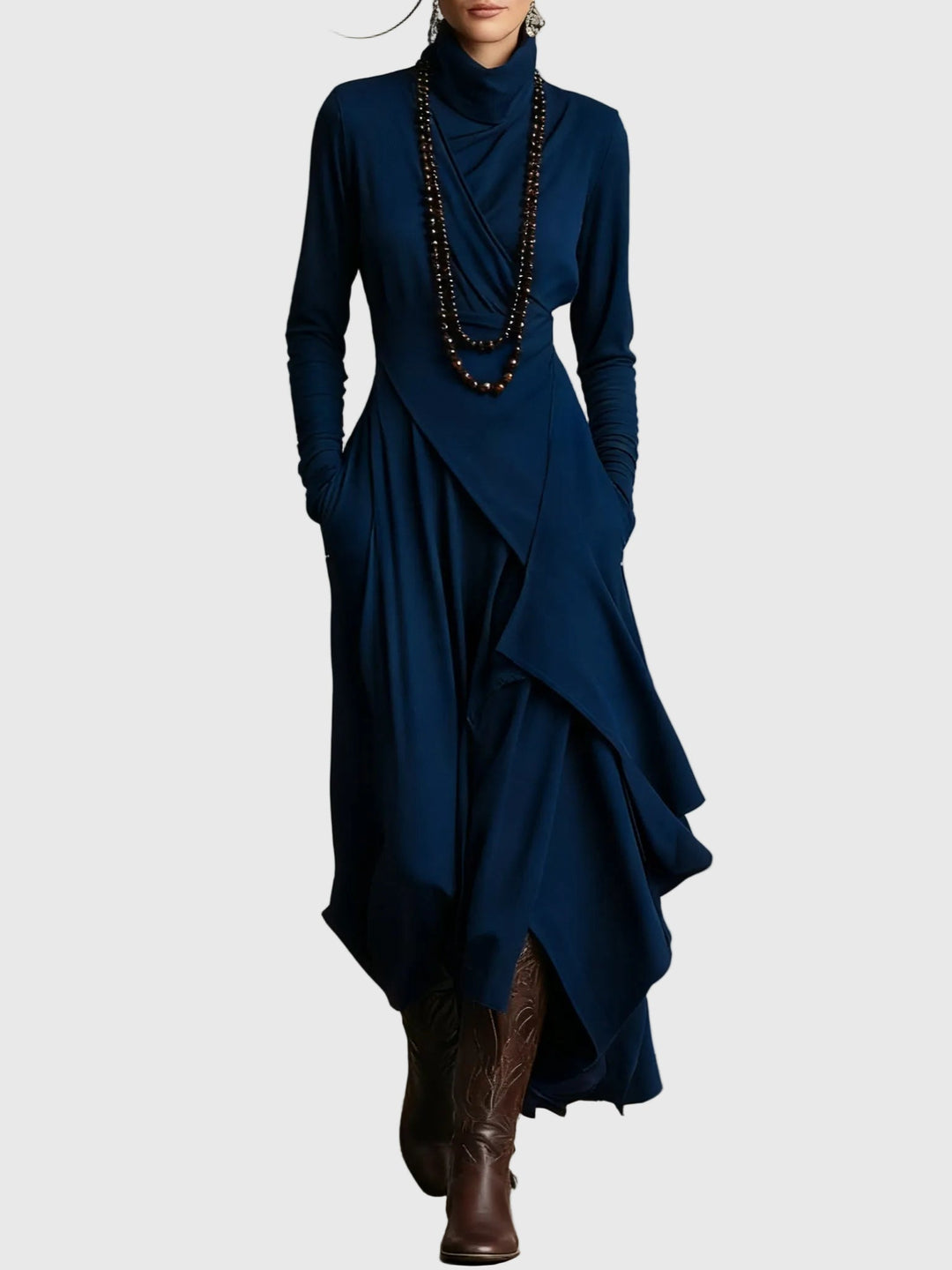 Woman wearing the Lucy draped high-neck maxi dress in violet with ankle boots.