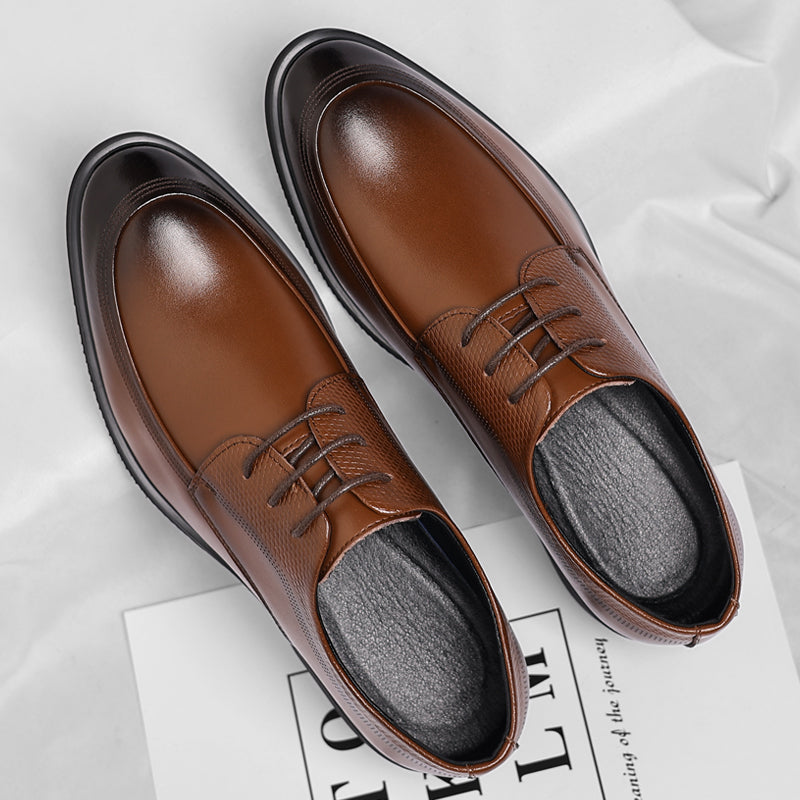 Men's brown polished Oxford shoes with a high-shine finish and clean classic silhouette