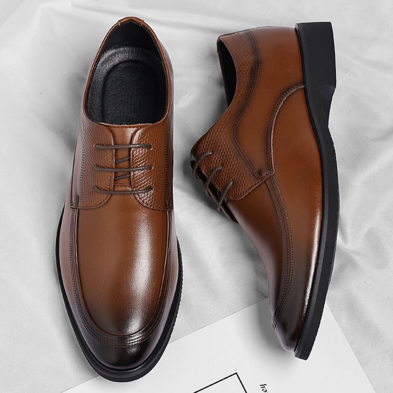 Men's brown polished Oxford shoes with a high-shine finish and clean classic silhouette
