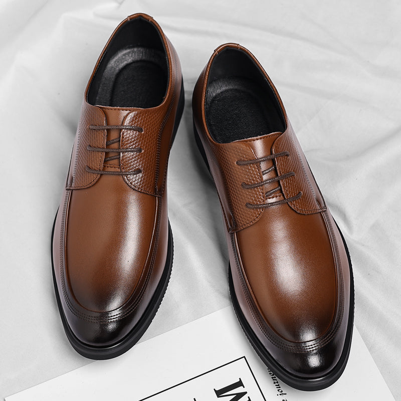 Men's brown polished Oxford shoes with a high-shine finish and clean classic silhouette