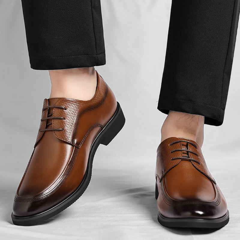 Men's brown polished Oxford shoes with a high-shine finish and clean classic silhouette