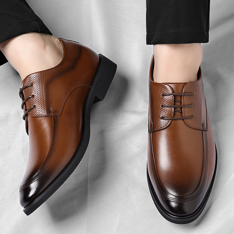 Men's brown polished Oxford shoes with a high-shine finish and clean classic silhouette